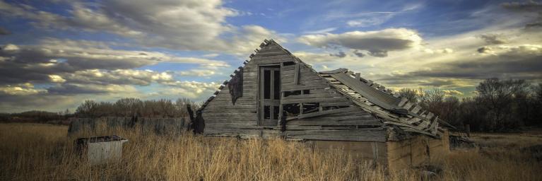 Old barn with collapsed roof